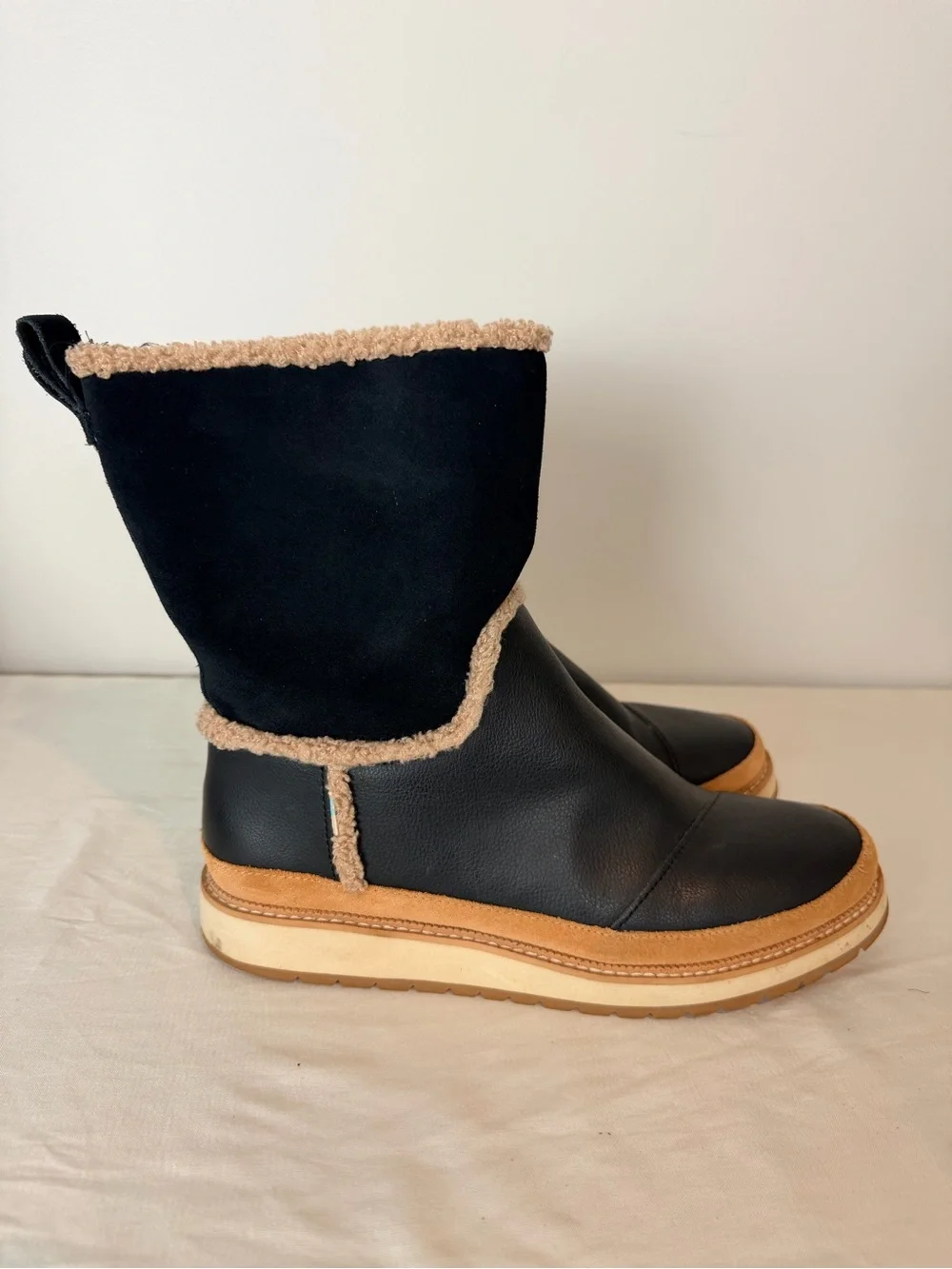 TOMS Black Shearling-Trim Winter Pull-On Boot with Tan Platform